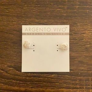 Sterling silver knot earrings with double backs.